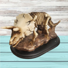 Încărcați imaginea în Galerie, Obiect Decor Cadou Statueta din Rasina Fosila Imitatie Schelet Dinozaur Triceratops pe Baza Lemn